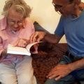 Rayek Rizek presenting his autobiographical book to Anne